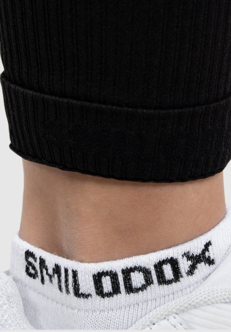 Smilodox Smilodox KOMPRESSION AMAZE - Leggings - schwarz Jubiläumsangebot
