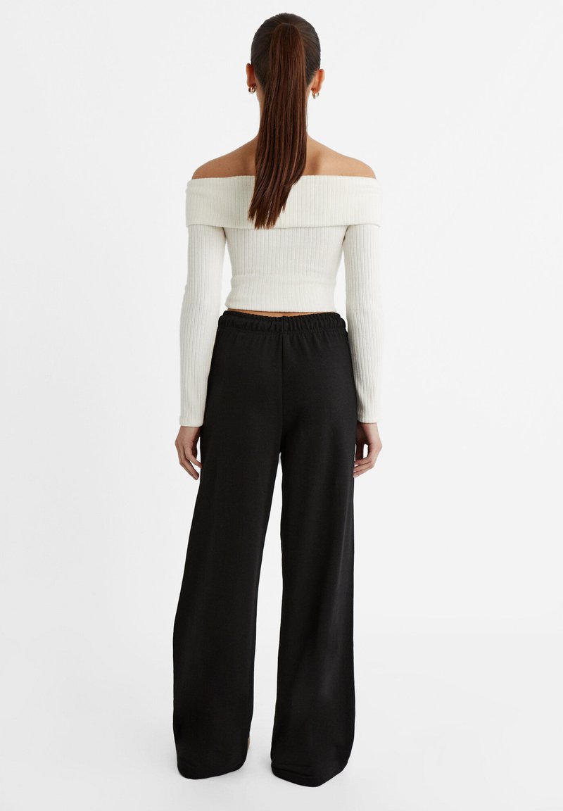 Stradivarius Stradivarius WIDE-LEG JOGGER - Tracksuit bottoms - black Im Verkauf