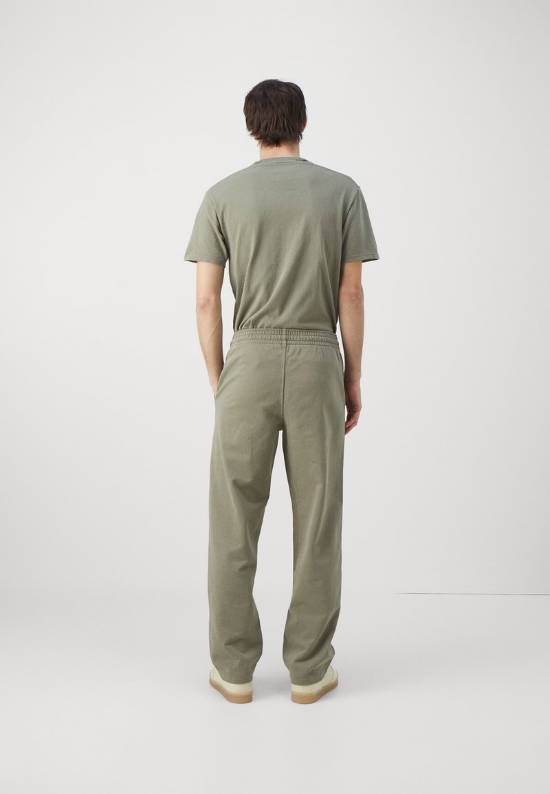 Holzweiler Holzweiler LAGOON OSLO TROUSERS UNISEX - Tracksuit bottoms - green Wochenangebot