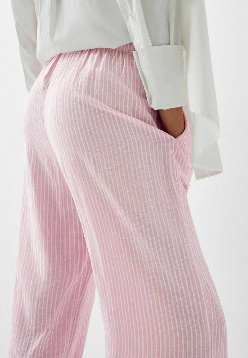 Bershka Bershka WITH AN ELASTIC - Trousers - light pink Begrenzt auf 3 Tage