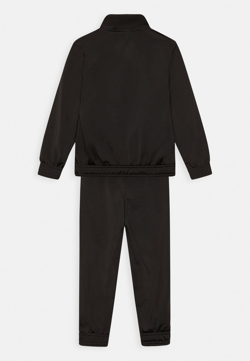 Puma Puma SUIT UNISEX SET - Tracksuit - puma black 2025
