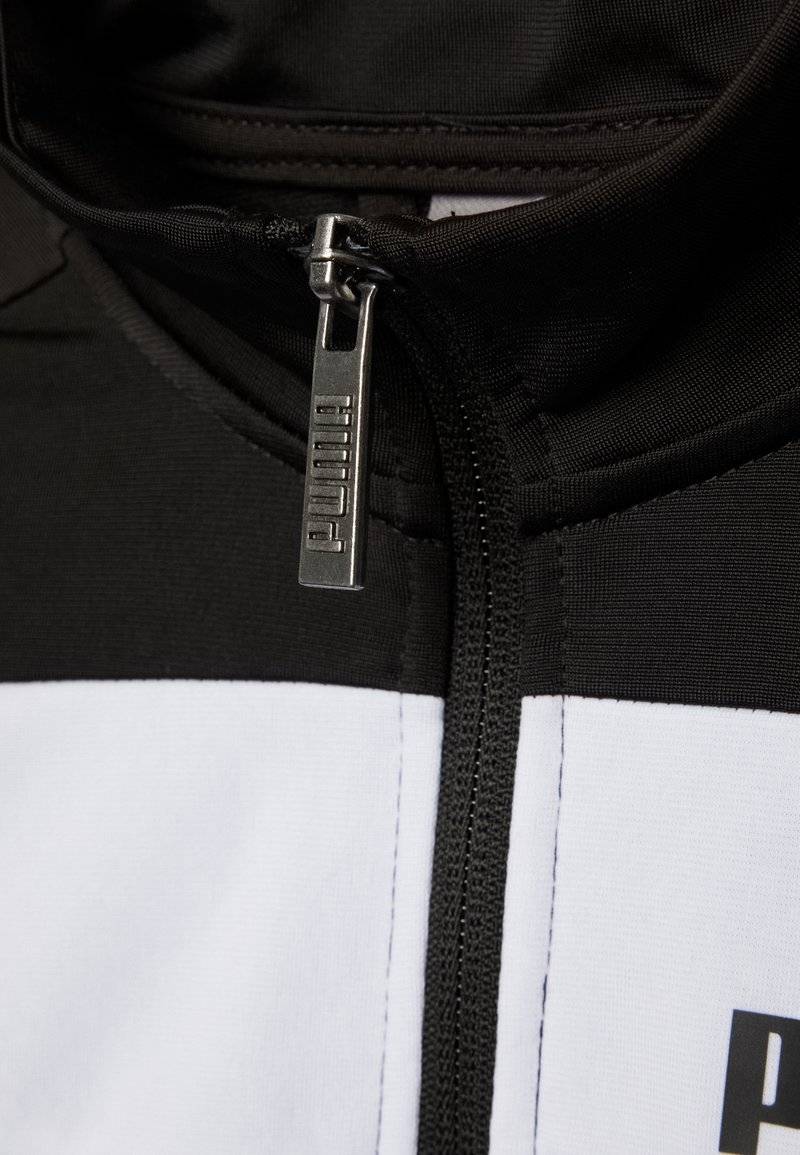 Puma Puma SUIT UNISEX SET - Tracksuit - puma black 2025