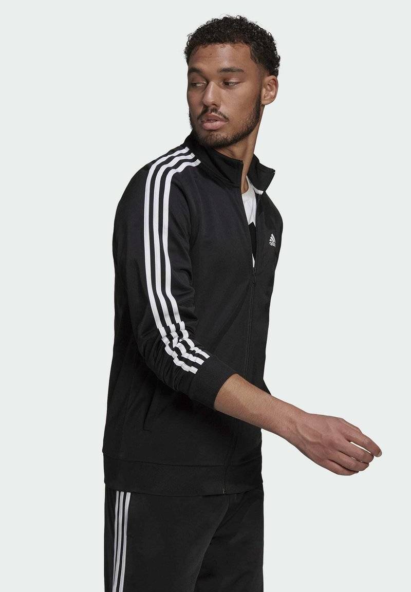 adidas Sportswear adidas Sportswear ESSENTIALS WARM-UP REGULAR 3-STRIPES - Training jacket - black Bestseller