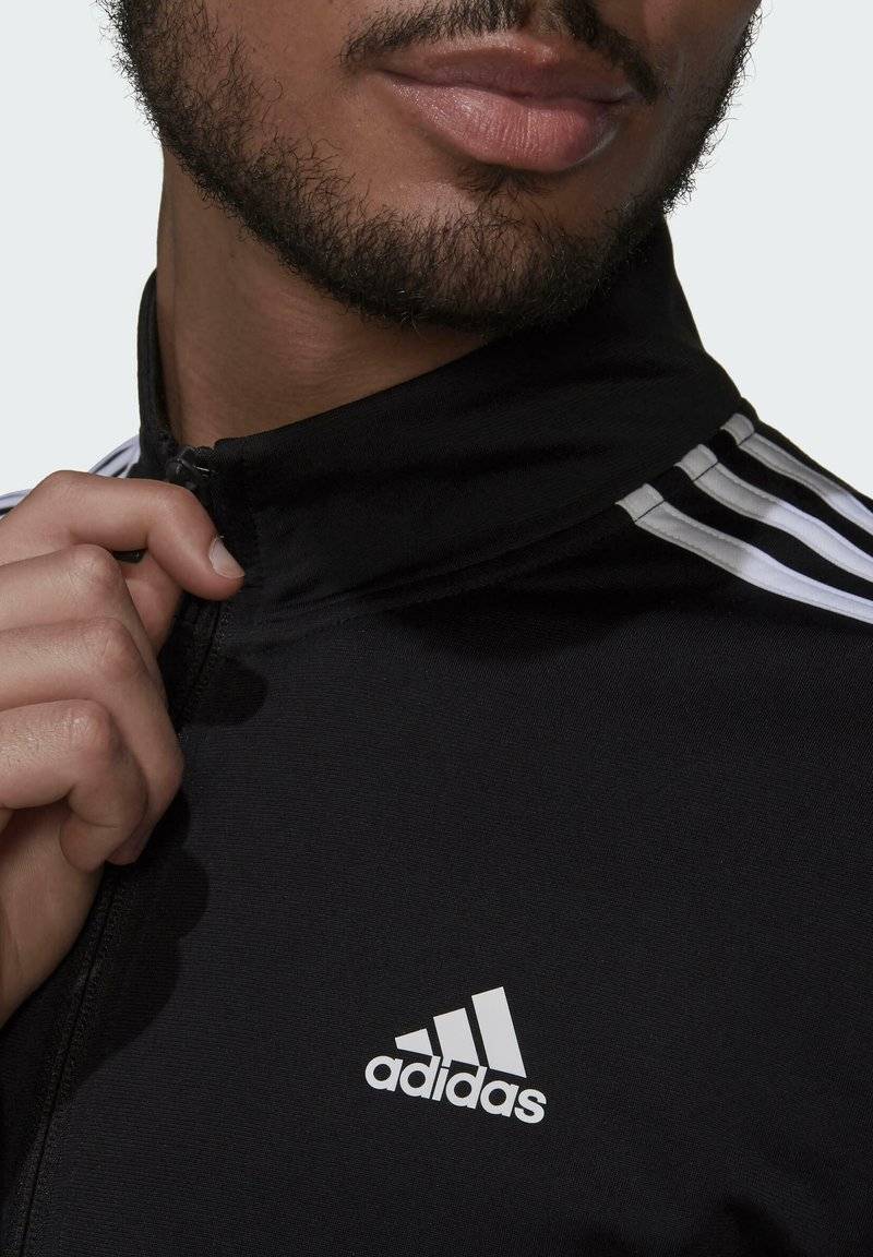 adidas Sportswear adidas Sportswear ESSENTIALS WARM-UP REGULAR 3-STRIPES - Training jacket - black Bestseller