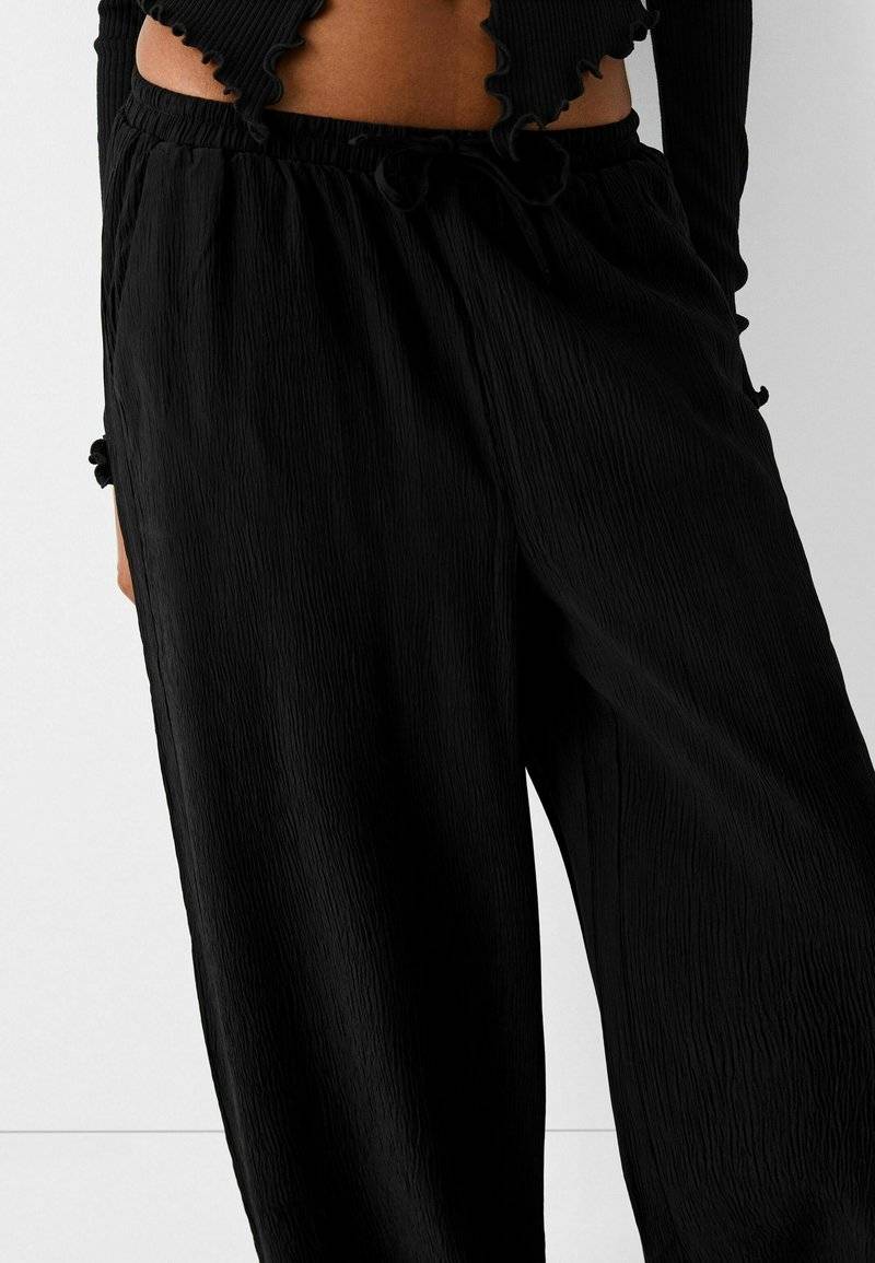 Bershka Bershka Trousers - black Bis zu 55% Rabatt
