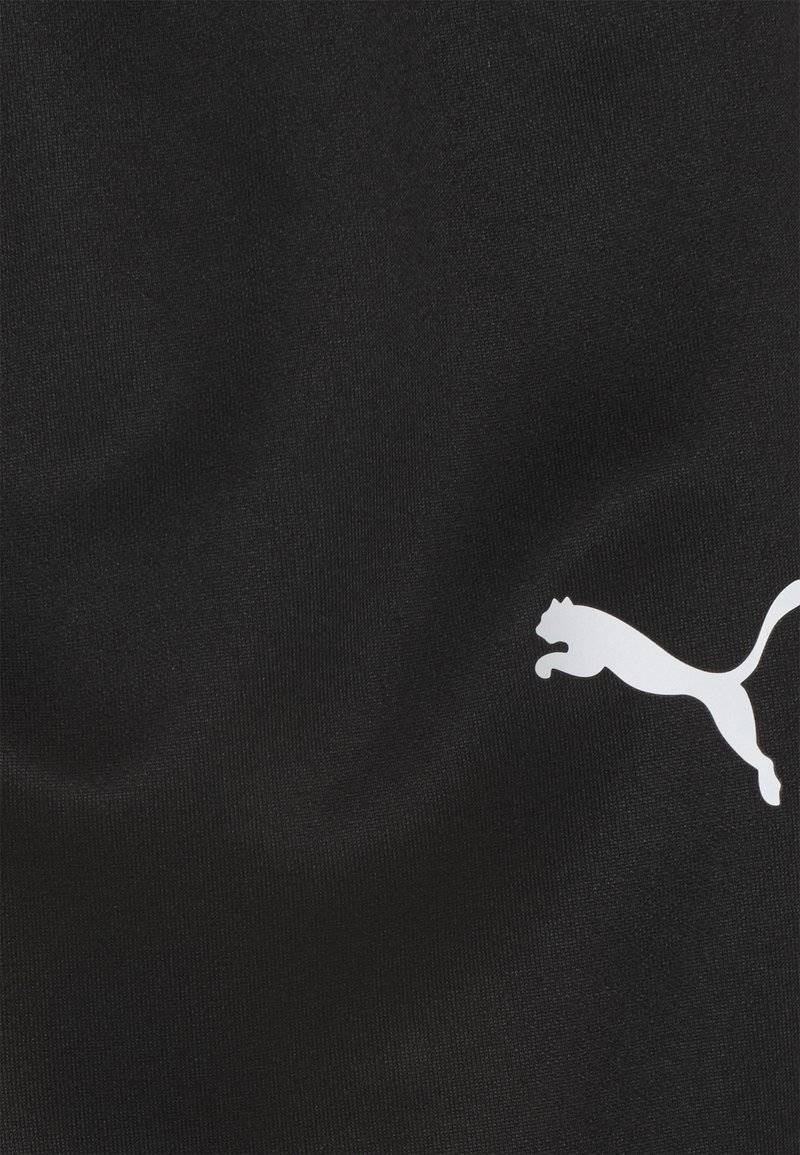 Puma Puma TEAMRISE POLY TRAINING UNISEX - Tracksuit bottoms Cyber Monday