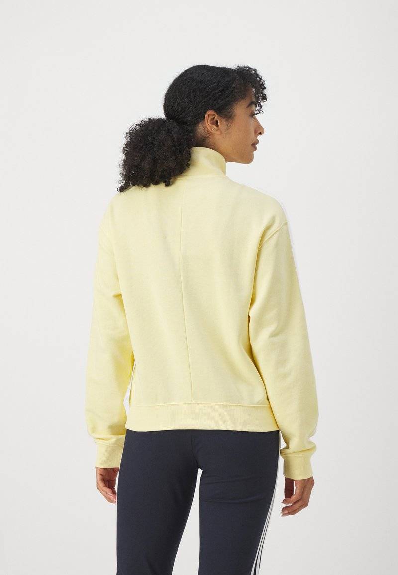 adidas Sportswear adidas Sportswear ESSENTIALS 3-STRIPES QUARTER ZIP - Sweatshirt - almost yellow Meist gekauft