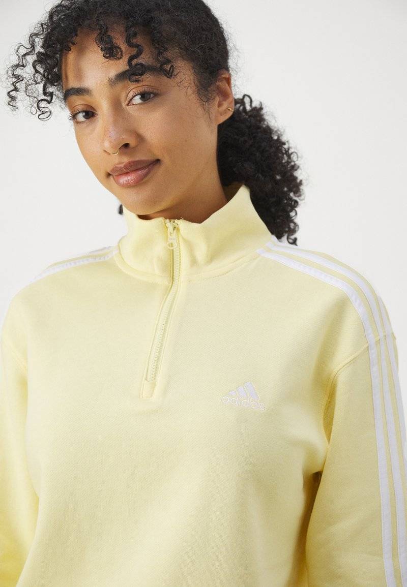 adidas Sportswear adidas Sportswear ESSENTIALS 3-STRIPES QUARTER ZIP - Sweatshirt - almost yellow Meist gekauft