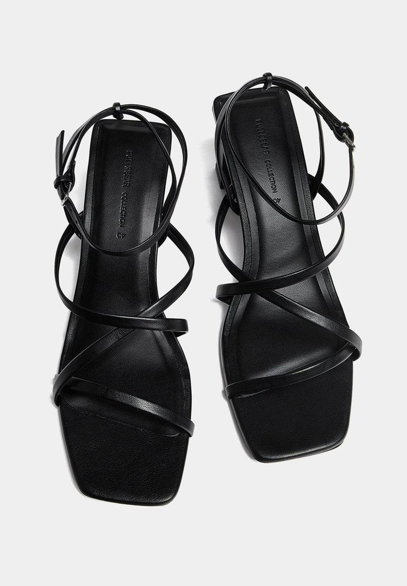 PULL&BEAR PULL&BEAR WITH CROSSOVER STRAPS - Sandals - black Heißer Verkauf