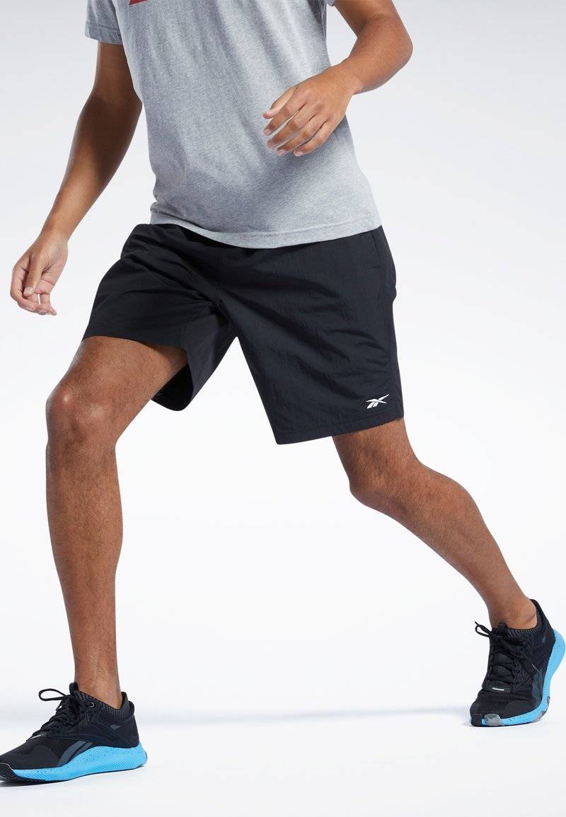 Reebok Reebok ID TRAIN UTILITY - Sports shorts - black