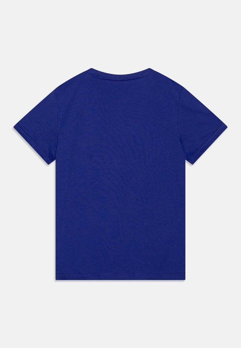 Puma Puma LOGO TEE UNISEX - Print T-shirt - lapis lazuli Begrenztes Angebot