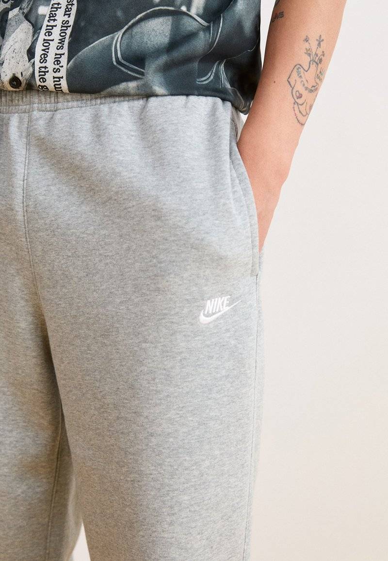 Nike Sportswear Nike Sportswear BUNGIE PANT - Tracksuit bottoms - grey heather Exklusive Angebote