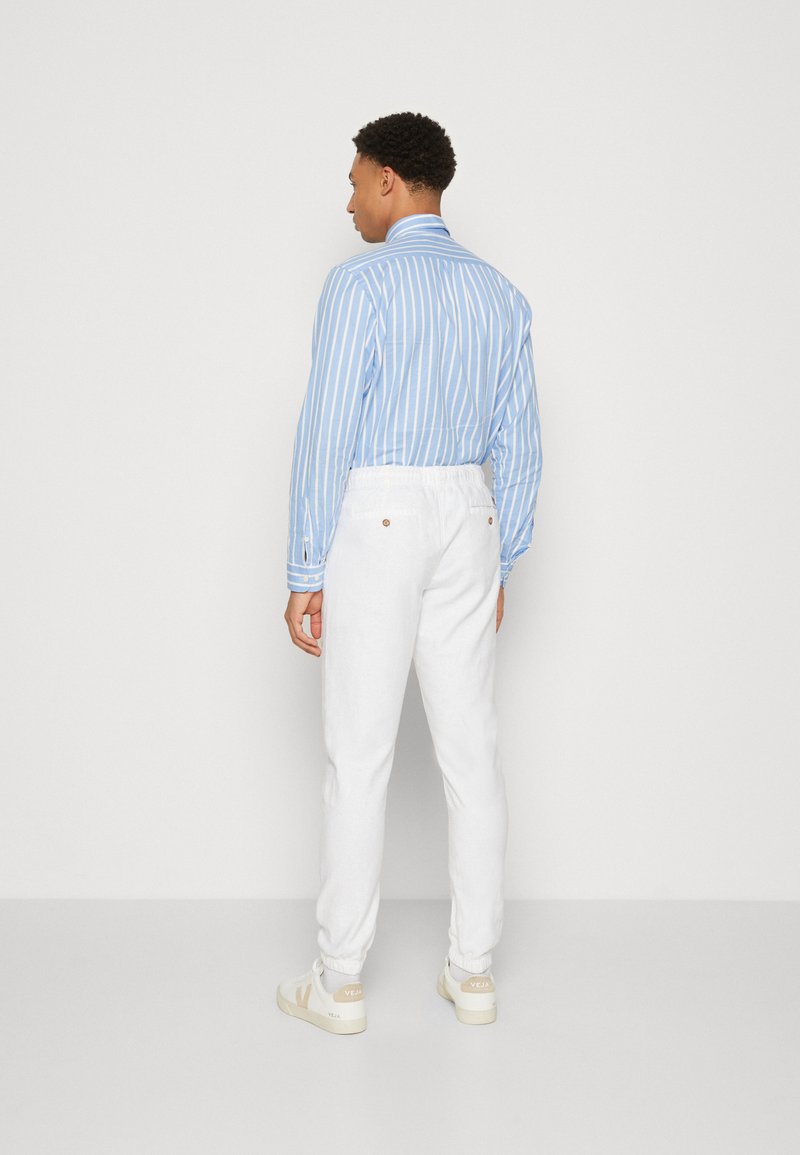 INDICODE JEANS INDICODE JEANS Trousers - offwhite Rabatte dieses Monats