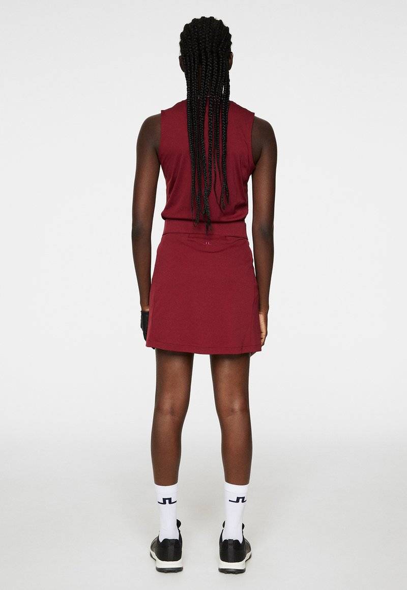 J.LINDEBERG Sports J.LINDEBERG Sports AMELIE MID - Sports skirt - cabernet Weihnachtsangebot
