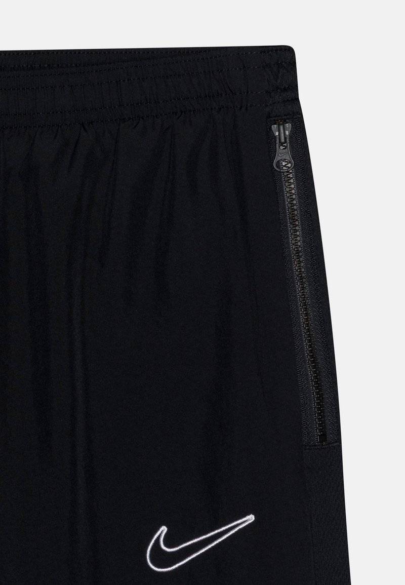 Nike Performance Nike Performance ACADEMY 23 TRACK PANT UNISEX - Tracksuit bottoms Bestseller