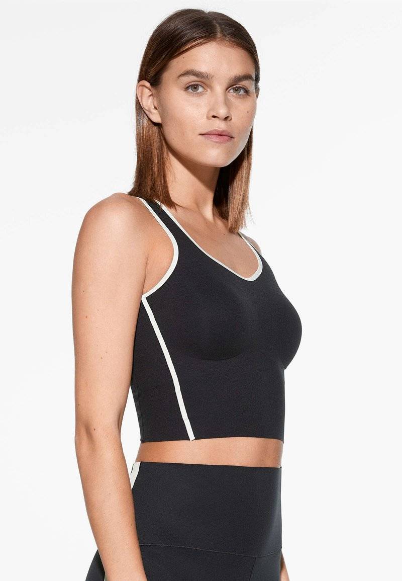 OYSHO OYSHO PERFECT-ADAPT PIPING - Sports T-shirt - black Lagerräumung