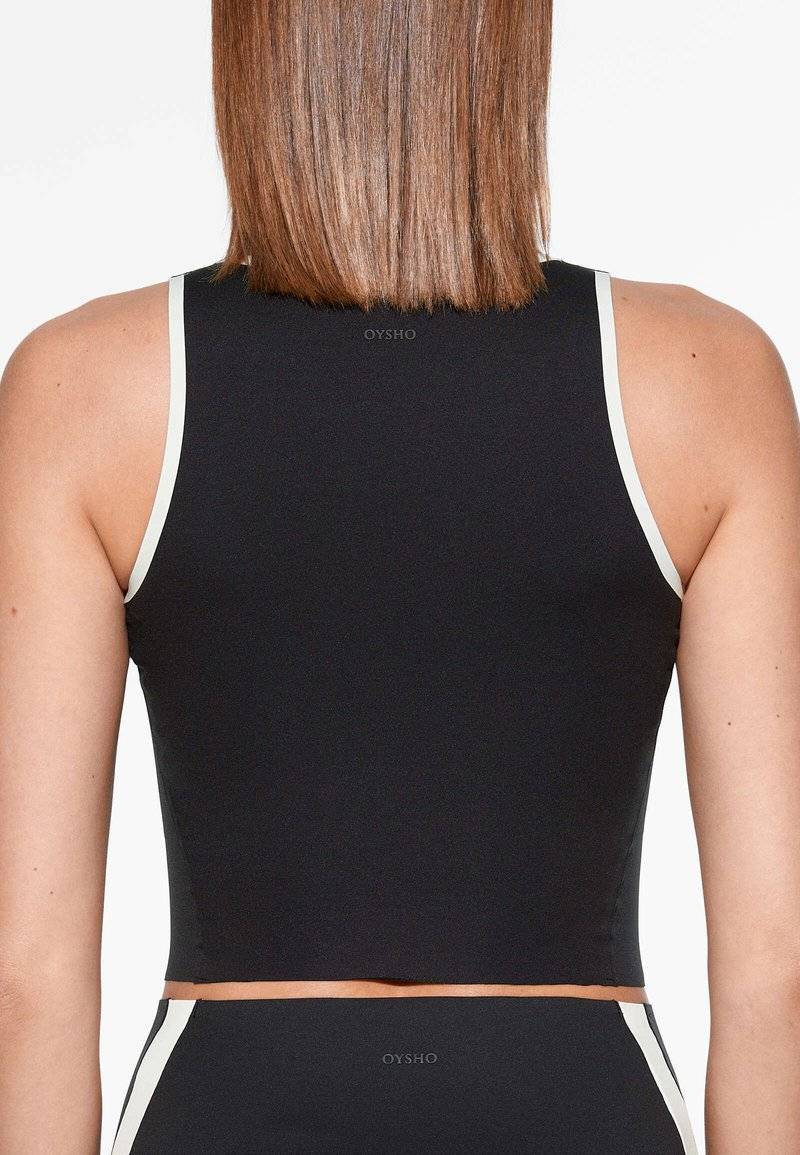 OYSHO OYSHO PERFECT-ADAPT PIPING - Sports T-shirt - black Lagerräumung