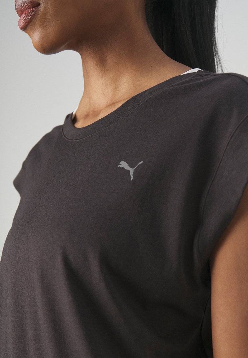 Puma Puma STUDIO FOUNDATIONS TEE - Sports T-shirt - black Verkauf