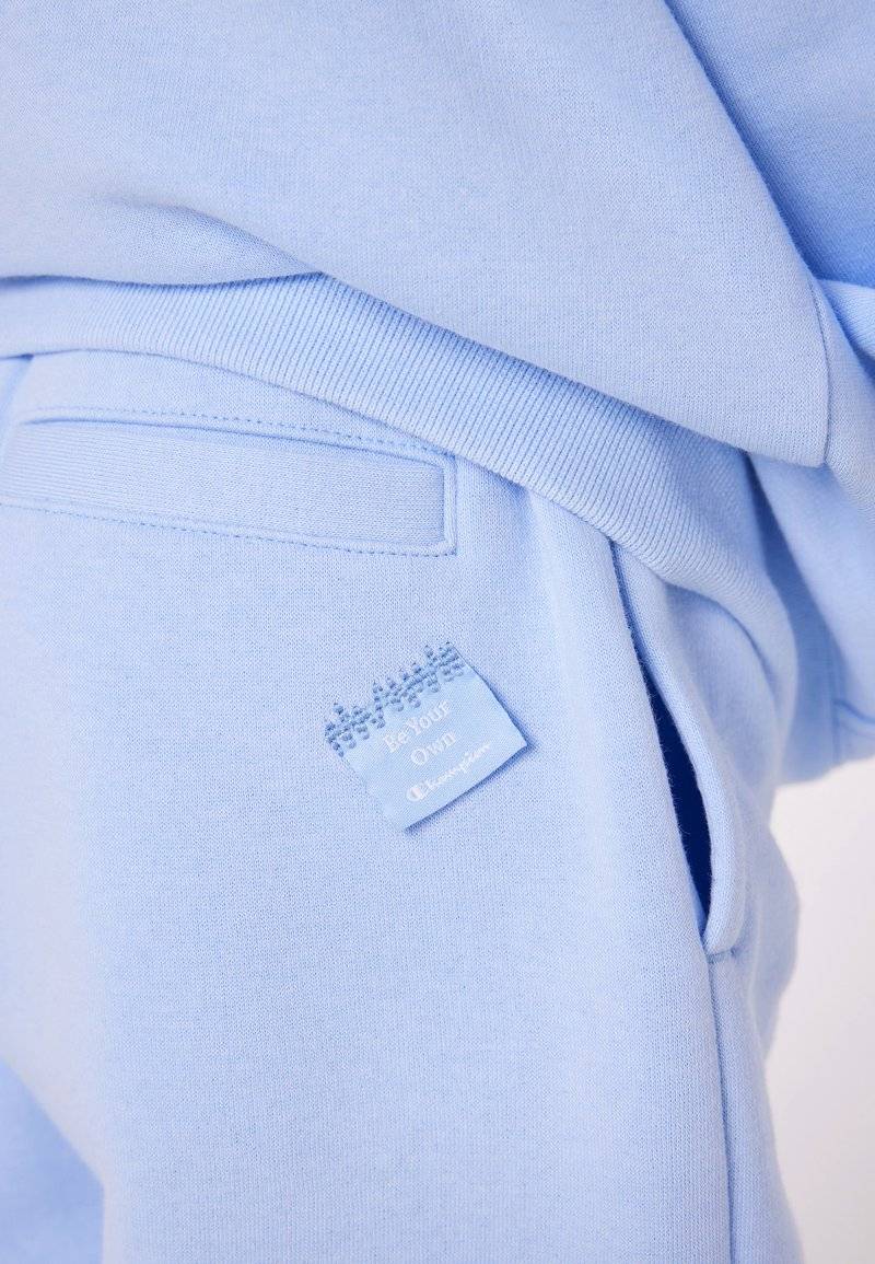 Champion Champion EXCLUSIVE PANT UNISEX - Tracksuit bottoms - light blue Heißer Verkauf