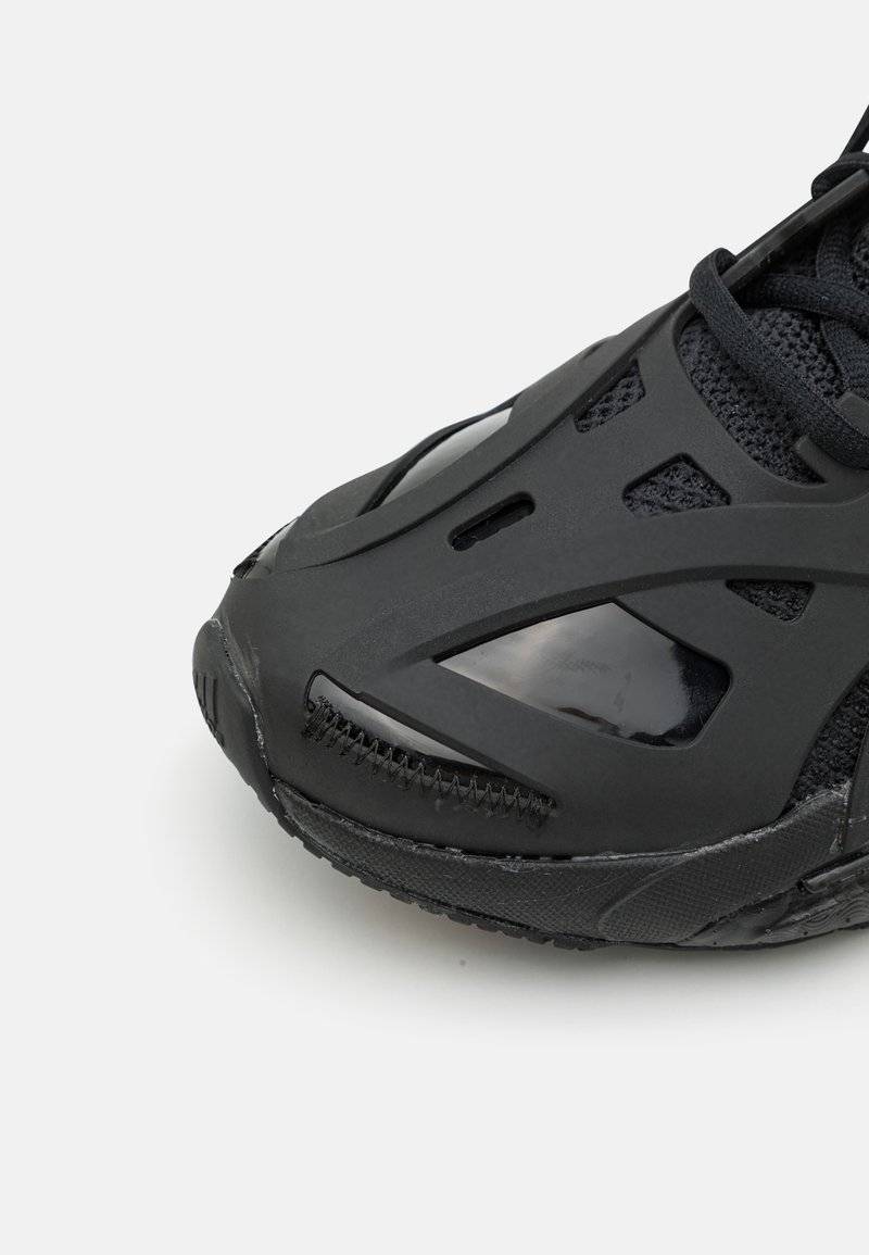 adidas by Stella McCartney adidas by Stella McCartney ADIDAS BY STELLA MCCARTNEY SOLAR GLIDE - Competition running shoes - core black Top Angebot