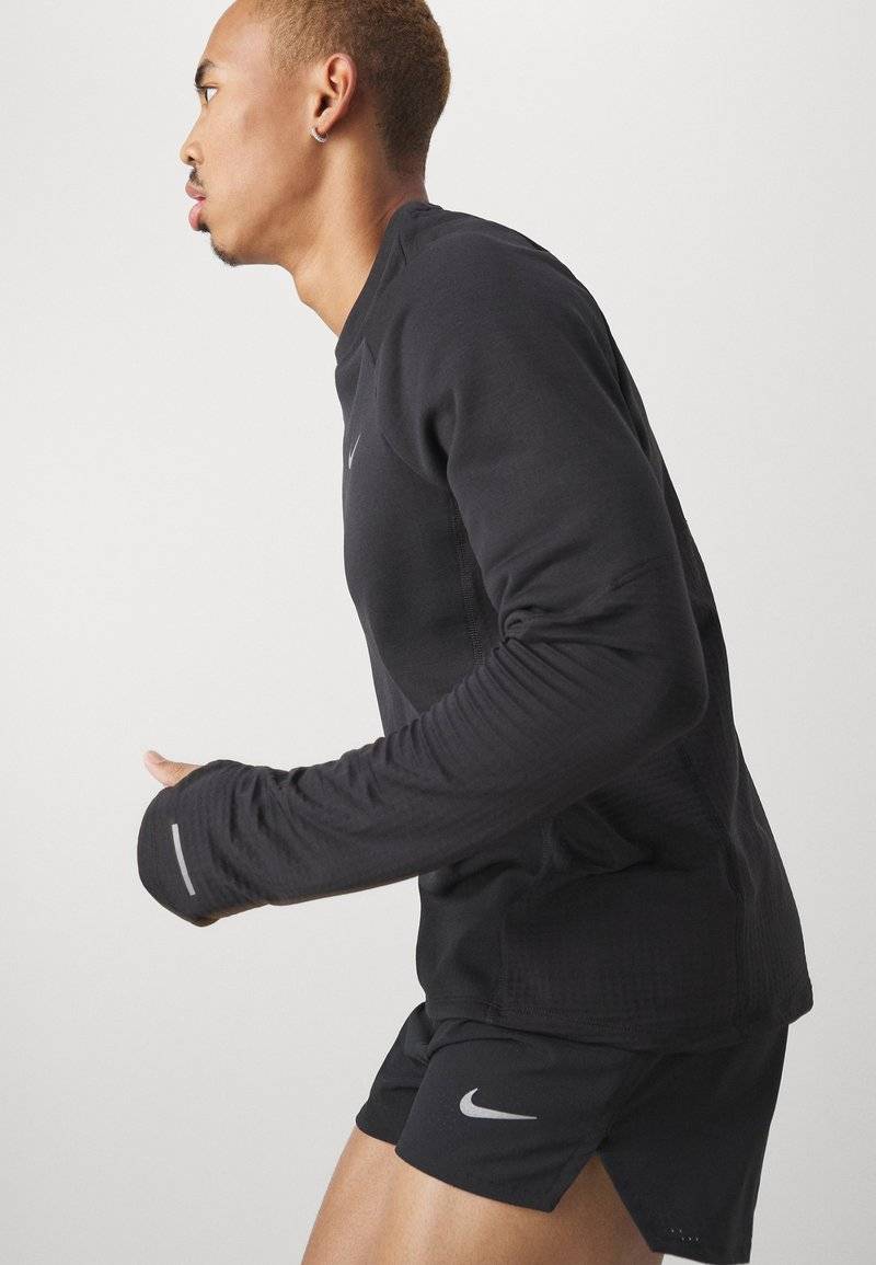 Nike Performance Nike Performance FAST SHORT - Sports shorts Super Sparpreis