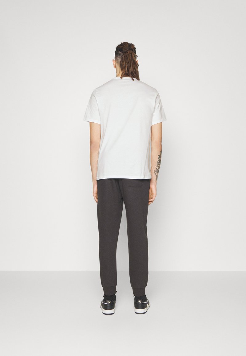 Converse Converse GO TO STAR CHEVRON TEE UNISEX - Print T-shirt - white Nur für heute
