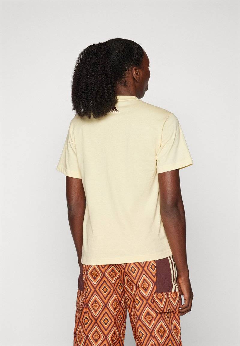 adidas Sportswear adidas Sportswear ADIDAS FARM RIO GRAPHIC - Print T-shirt - easy yellow Osterangebot