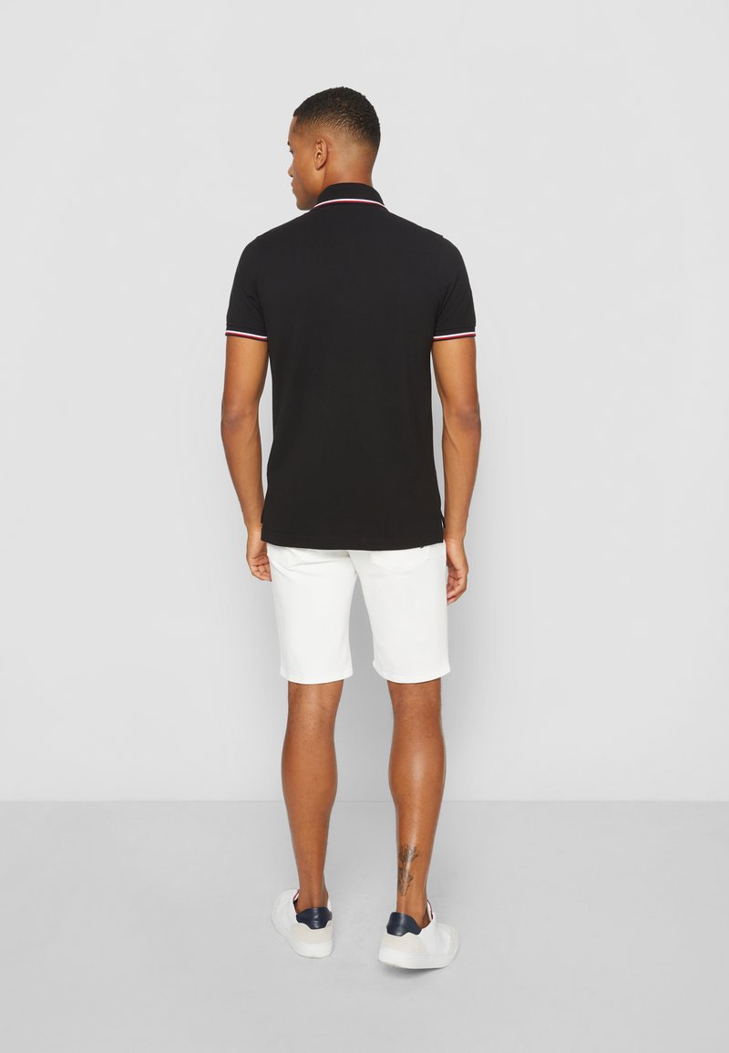 Tommy Hilfiger Tommy Hilfiger TIPPED SLIM - Polo shirt - black Speichern exportieren