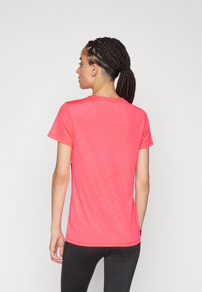 Puma Puma PERFORMANCE TEE - Sports T-shirt - sunset glow zollfrei