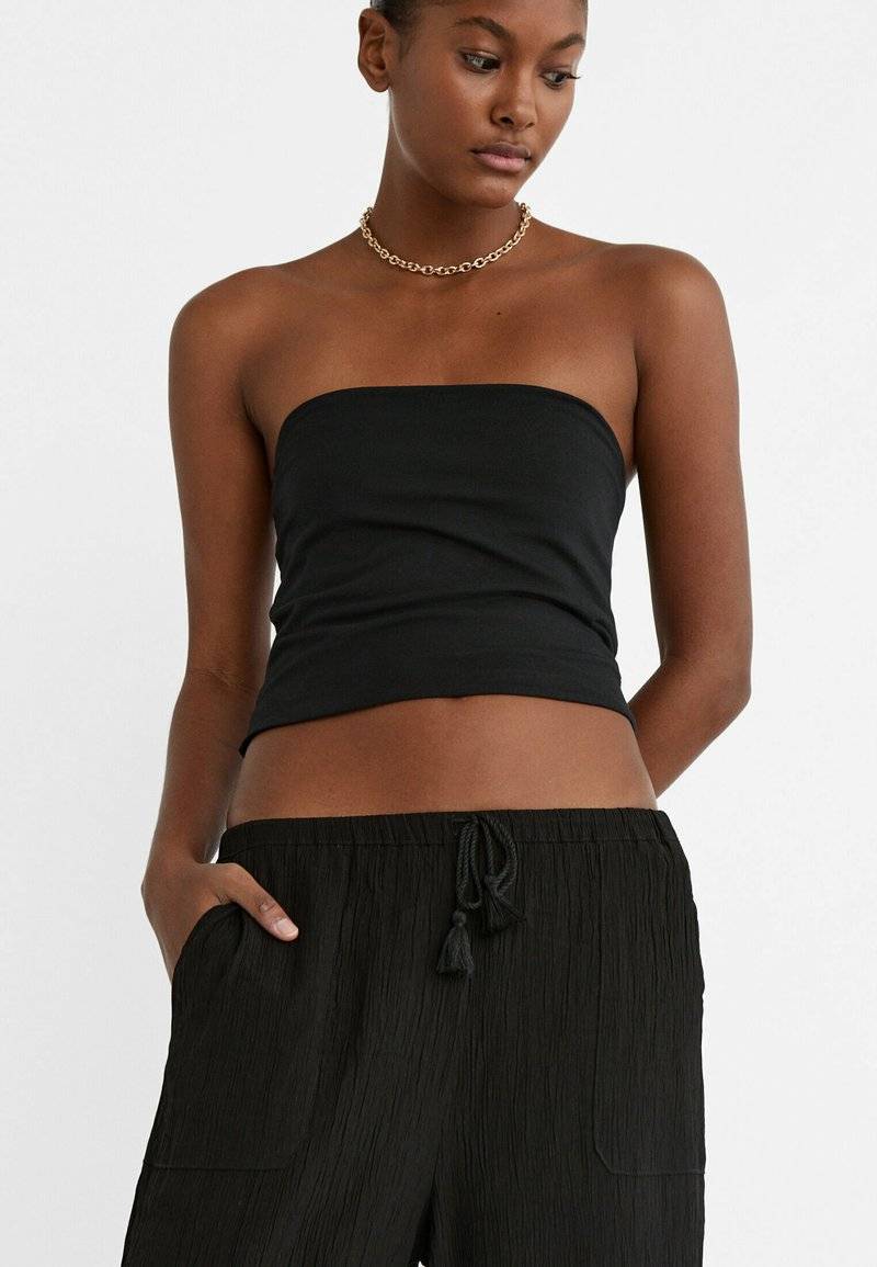 Stradivarius Stradivarius FLOWING CULOTTES - Trousers - black Rabatte dieses Monats