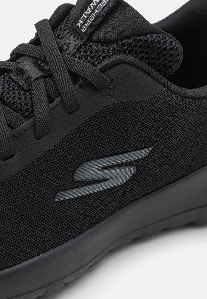 Skechers Performance Skechers Performance GO WALK BUNGEE - Walking trainers - black Blitzverkäufe