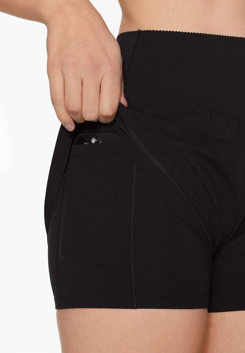 OYSHO OYSHO COMPRESSIVE - Sports shorts - black Kostenloser Versand